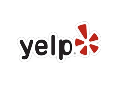 Yelp logo on a white background for cosmetic surgery reviews.