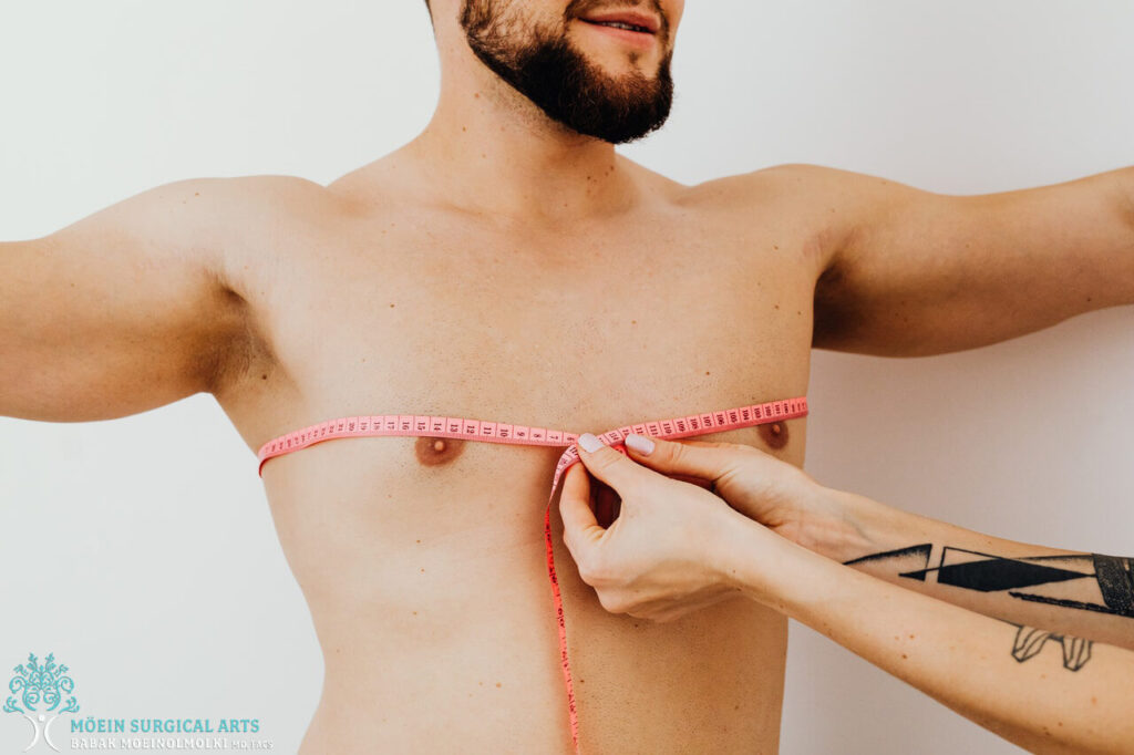 A man measuring his chest with a measuring tape.