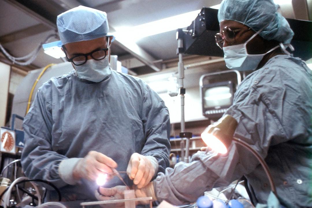 Two surgeons working in an operating room.
